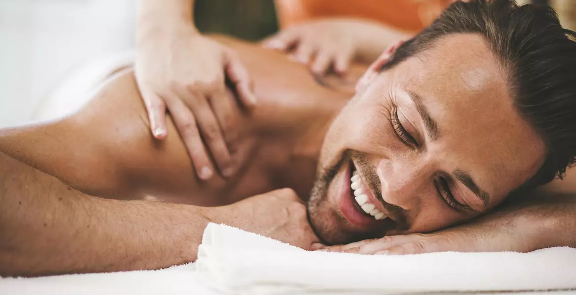 man-enjoys-back-massage